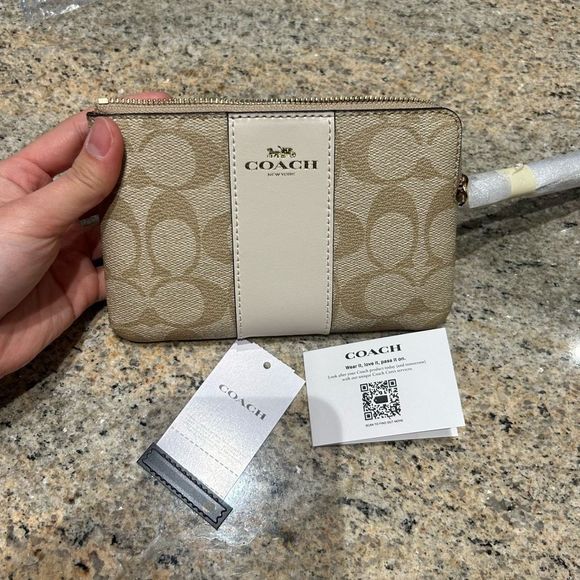 Coach Handbags - NWT Coach Corner Zip Wristlet In Signature Canvas